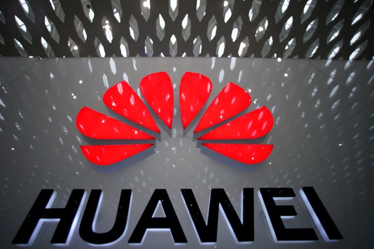 FILE PHOTO: A Huawei company logo is pictured at the Shenzhen International Airport in Shenzhen, Guangdong province, China July 22, 2019. REUTERS/Aly Song/File Photo