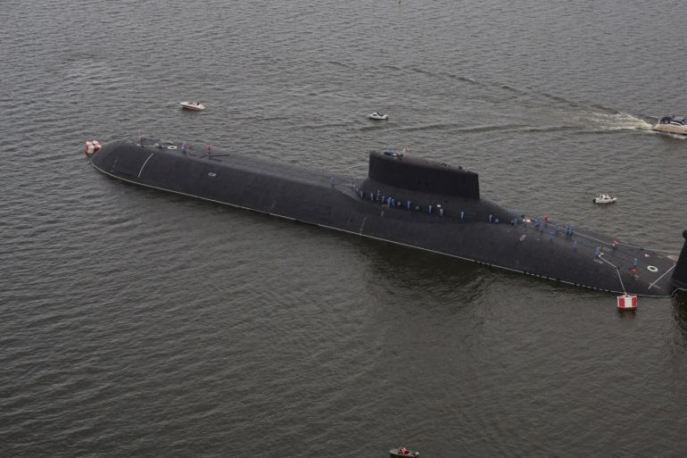 An aerial view shows the Russian nuclear submarine Dmitry Donskoy moored on the eve of the the Navy Day parade in Kronshtadt, a seaport town in the suburb of St. Petersburg, Russia, July 28, 2017. REUTERS/Anton Vaganov