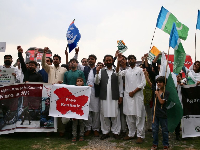 Protest against Indian government's decision on Kashmir in Islamabad- - ISLAMABAD, PAKISTAN - AUGUST 06: People hold placards during a protest against the Indian government's decision to repeal Article 370 of the Constitution that grants special status to Jammu and Kashmir in Islamabad, Pakistan on August 06, 2019.