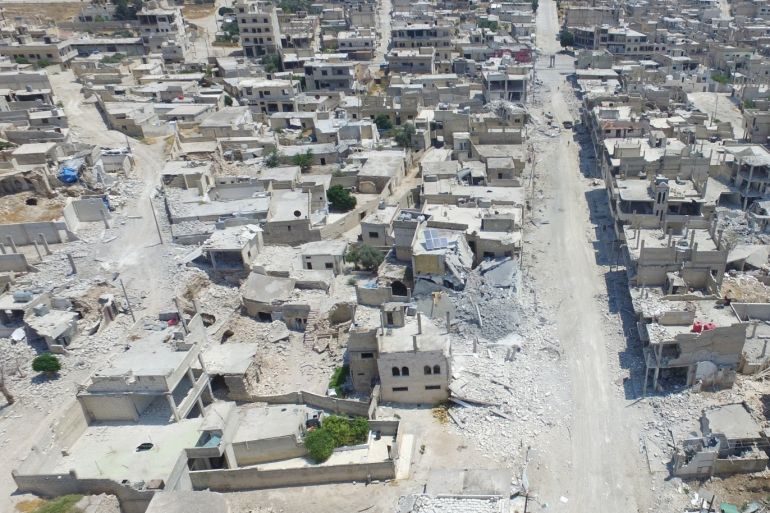 Ceasefire hope of Syrians willing to return home- - IDLIB, SYRIA - AUGUST 03: An aerial view of the damaged buildings after the attacks of Assad regime and its supporters in the de-escalation zone of Khan Shaykhun town of Syria's Idlib on August 03, 2019.