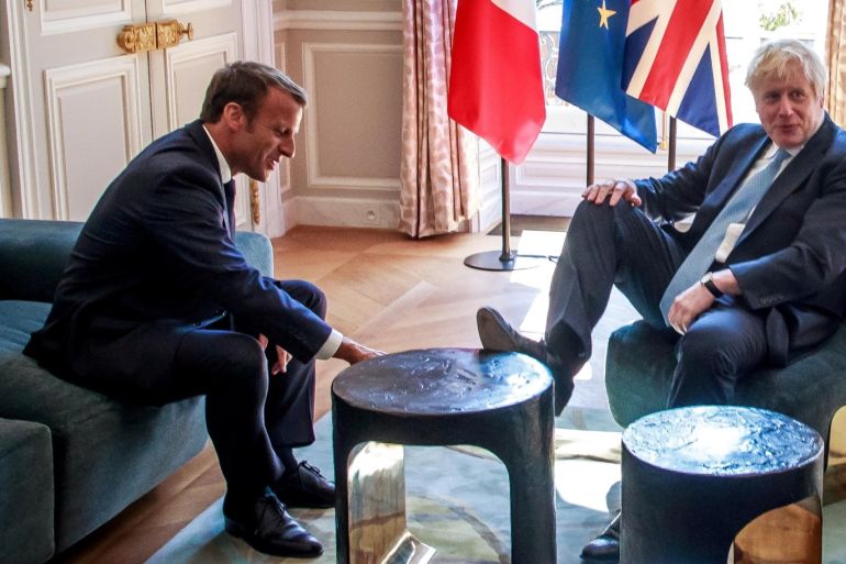 French President Emmanuel Macron and British Prime Minister Boris Johnson speak during a meeting at the Elysee Palace in Paris, France, August 22, 2019. Christophe Petit Tesson/Pool via REUTERS
