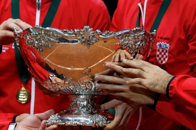Tennis - Davis Cup Final - France v Croatia - Stade Pierre Mauroy, Lille, France - November 25, 2018 Team Croatia celebrate with the trophy after winning the Davis Cup REUTERS/Pascal Rossignol
