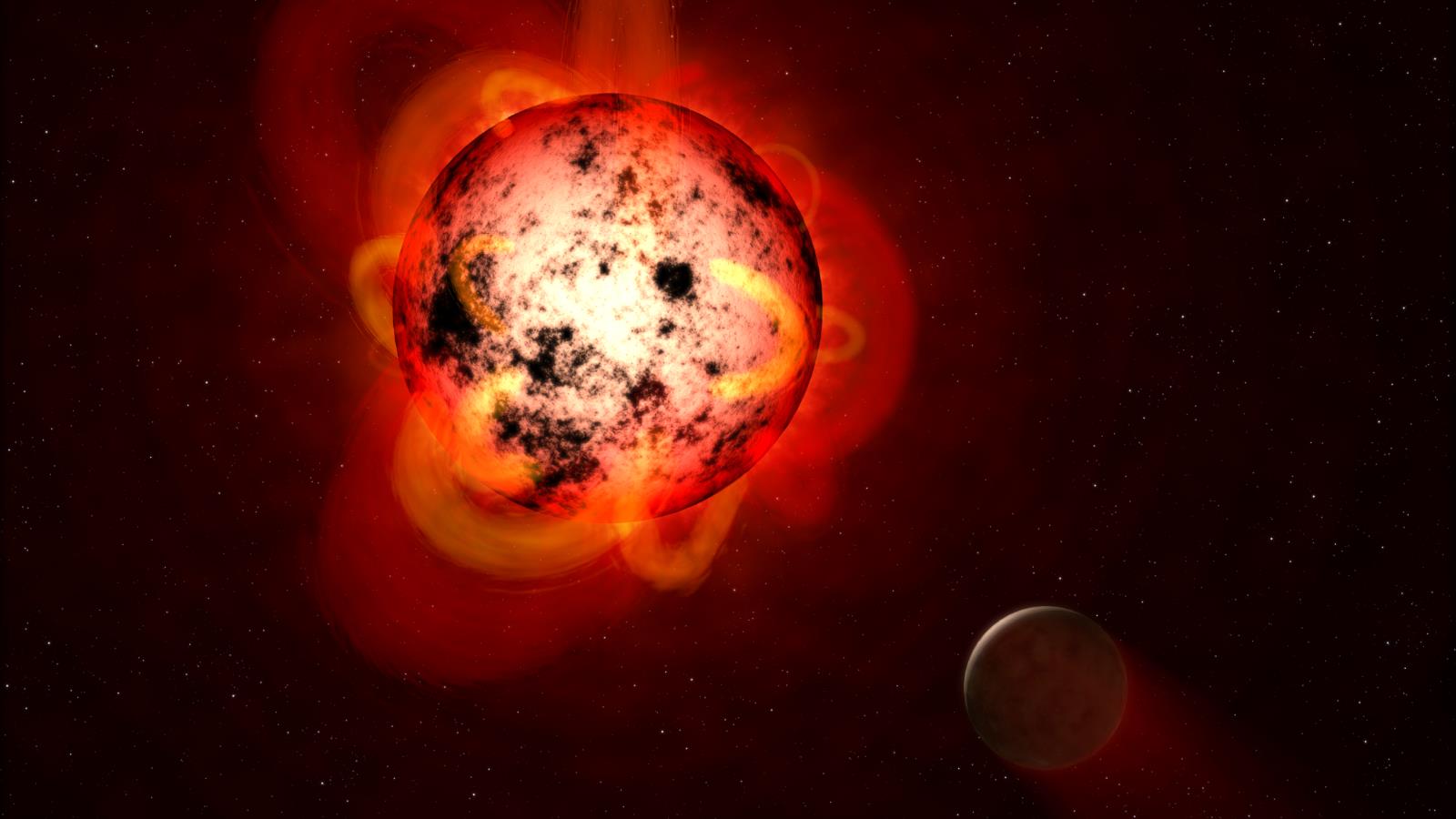 ‪الأقزام الحمراء أصغر في الحجم من الشمس بحيث سيبدو أحدها بحجم كرة تنس أرضي إذا كانت الشمس بحجم كرة قدم‬ (مواقع إلكترونية)