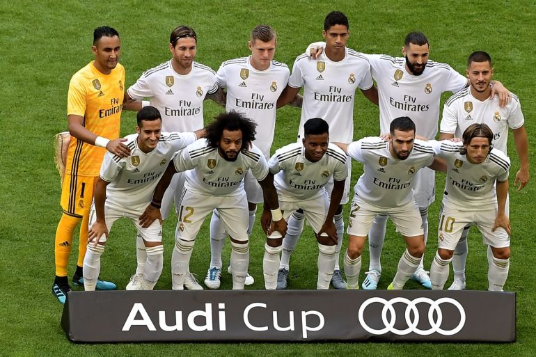MUNICH, GERMANY - JULY 30: The players of Real Madrid: Lucas Vazquez (front row, L-R), Marcelo, Rodrygo Silvadegoes, Daniel Carvajal, Luka Modric, Keylor Navas (second row, L-R) , Sergio Ramos, Toni Kroos, Raphael Varane, Karim Benzema and Eden Hazard line up prior the Audi cup 2019 semi final match between Real Madrid and Tottenham Hotspur at Allianz Arena on July 30, 2019 in Munich, Germany. (Photo by Alexander Scheuber/Getty Images for AUDI)