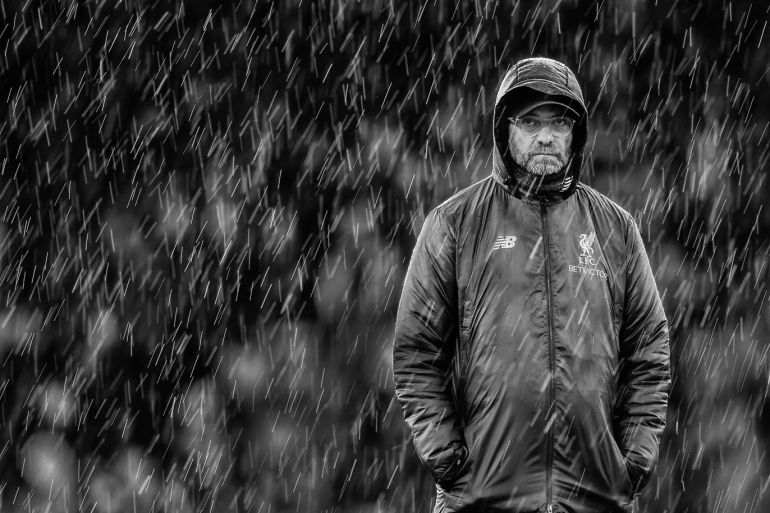 LONDON, ENGLAND - MARCH 17: (EDITORS NOTE: Image has been converted to black and white.) Liverpool manager Jurgen Klopp looks on during the Premier League match between Fulham FC and Liverpool FC at Craven Cottage on March 17, 2019 in London, United Kingdom. (Photo by Michael Regan/Getty Images)