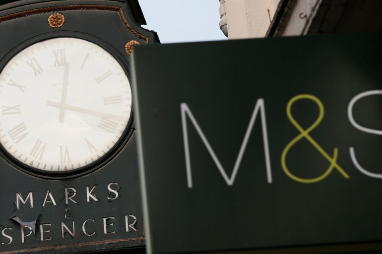 Marks & Spencer signs are seen outside outside a store in London January 8, 2014. REUTERS/Stefan Wermuth/File Photo GLOBAL BUSINESS WEEK AHEAD PACKAGE Ð SEARCH ÒBUSINESS WEEK AHEAD JULY 4Ó FOR ALL IMAGES