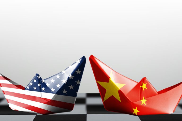 USA flag and China flag print screen on ship with white background.It is symbol of tariff trade war tax barrier between United States of America and China.-Image.