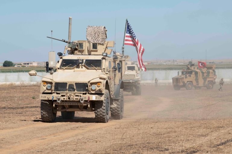 U.S. and Turkish military forces conduct a joint ground patrol inside the security mechanism area in northeast, Syria, September 8, 2019. Picture taken September 8, 2019. U.S. Army/Spc. Alec Dionne/Handout via REUTERS. THIS IMAGE HAS BEEN SUPPLIED BY A THIRD PARTY.
