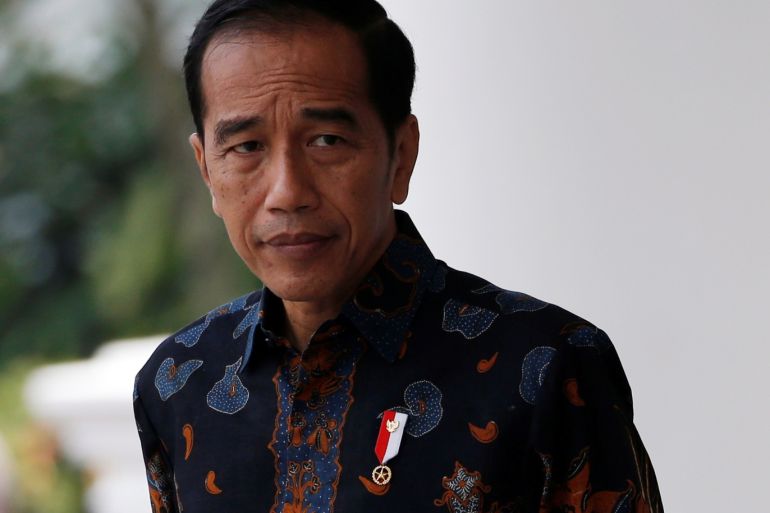 Indonesian President Joko Widodo reacts as he waits for Dutch Prime Minister Mark Rutte before a welcoming ceremony at the presidential palace in Bogor, Indonesia, October 7, 2019. REUTERS/Willy Kurniawan