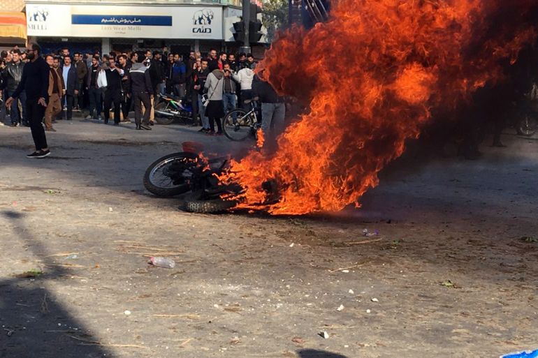 epa08002203 Iranian protesters clash in the streets following fuel price increase in the city of Isfahan, central Iran, 16 November 2019. Media reported that people protests in highways and in the streets after the government increased fuel price. Due to the ongoing economic crisis, the Iranian government has increased fuel prices up to 50 percent and the petrol price has become three times higher. EPA-EFE/STR