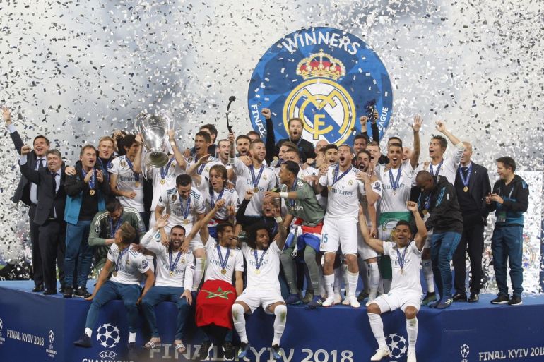 Real Madrid wins UEFA Champions League title- - KIEV, UKRAINE - MAY 26: Real Madrid players celebrate the victory after winning against Liverpool FC in the UEFA Champions League final football match at the Olimpiyskiy stadium in Kiev, Ukraine, on May 26, 2018.