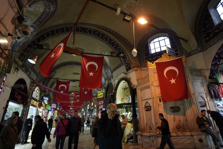 People stroll at the Grand Bazaar, known as the Covered Bazaar, in Istanbul, Turkey November 14, 2018. REUTERS/Murad SezerÊ