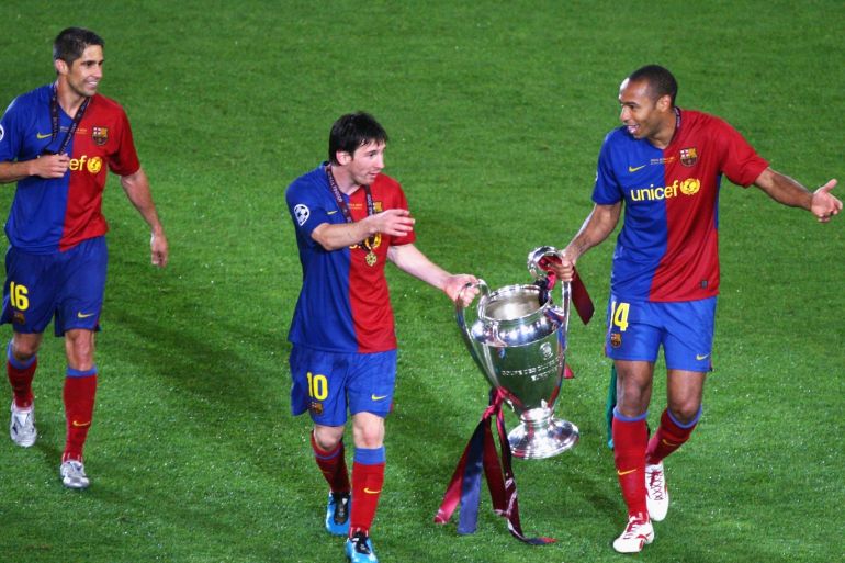 ROME - MAY 27: Thierry Henry of Barcelona and Lionel Messi of Barcelona celebrate winning the UEFA Champions League Final match between Manchester United and Barcelona at the Stadio Olimpico on May 27, 2009 in Rome, Italy. Barcelona won 2-0. (Photo by Paul Gilham/Getty Images)
