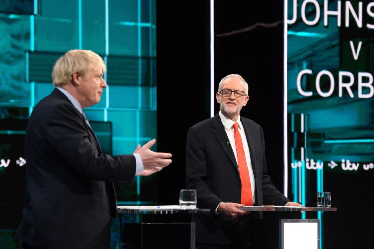 A handout photo made available by ITV shows British Prime Minister and Conservative Party leader Boris Johnson (L) and Labour Party leader Jeremy Corbyn (R) during live debate 'Johnson v Corbyn: The ITV Debate', at ITV Studios in Manchester, Britain, 19 November 2019. EPA-EFE/JONATHAN HORDLE / ITV / HANDOUT MANDATORY CREDIT: JONATHAN HORDLE / ITV EDITORIAL USE ONLY UNTIL 19 DECEMBER 2019 / HANDOUT NO SALES