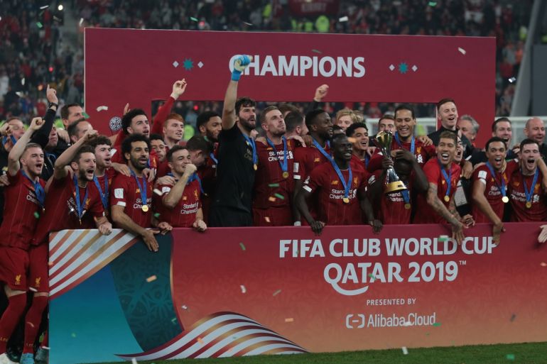 Liverpool win their first FIFA Club World Cup title- - DOHA, QATAR - DECEMBER 21: Players of Liverpool lift the trophy during a ceremony at the end of the FIFA Club World Cup Qatar 2019 Final match between Liverpool FC and CR Flamengo at Khalifa International Stadium in Doha, Qatar on December 21, 2019.