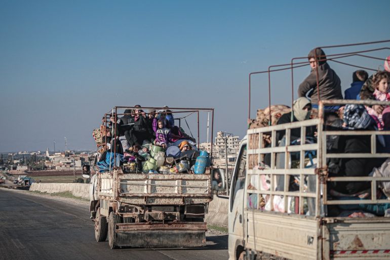 Forced migration in Syria's Idlib continues- - IDLIB, SYRIA - DECEMBER 18: Families, who have been forced to displace due to the ongoing attacks carried out by Assad regime and its supporters, are seen on their way to safer zones with their belongings, on December 18, 2019 in Idlib, Syria.