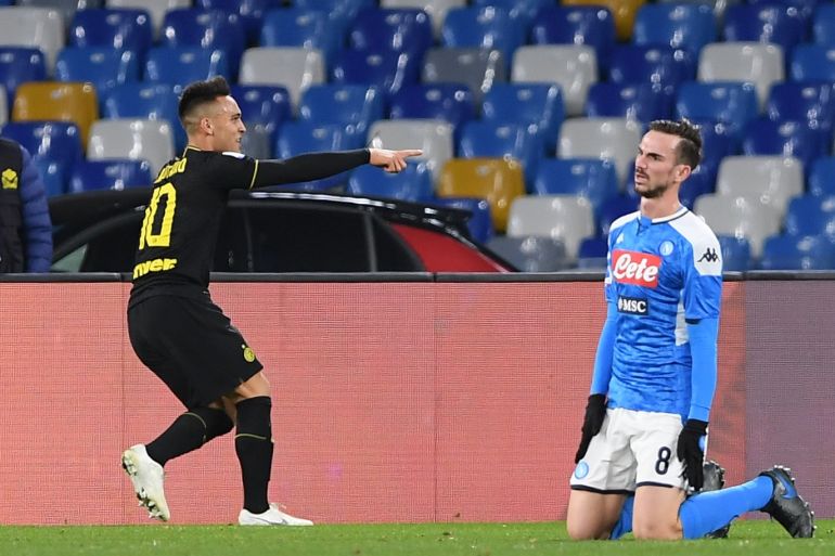 NAPLES, ITALY - JANUARY 06: Lautaro Martinez of FC Internazionale celebrates after scoring the 1-3 goal, beside the disappointment of Fabian Ruiz of SSC Napoli during the Serie A match between SSC Napoli and FC Internazionale at Stadio San Paolo on January 06, 2020 in Naples, Italy. (Photo by Francesco Pecoraro/Getty Images)