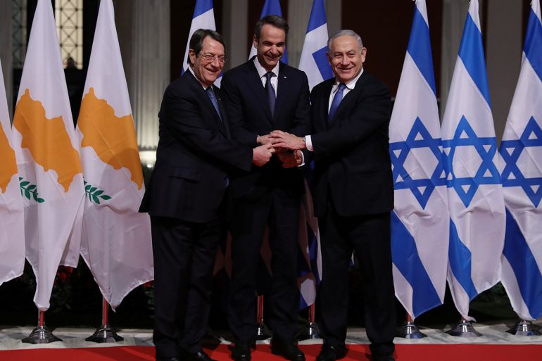Cypriot President Nicos Anastasiades, Greek Prime Minister Kyriakos Mitsotakis and Israeli Prime Minister Benjamin Netanyahu pose for a photo before signing a deal to build the EastMed subsea pipeline to carry natural gas from the eastern Mediterranean to Europe, at the Zappeion Hall in Athens, Greece, January 2, 2020. REUTERS/Alkis Konstantinidis