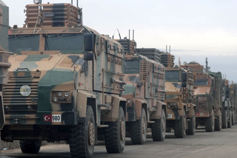 Turkish military vehicles are seen in Hazano near Idlib, Syria, February 11, 2020. REUTERS/Khalil Ashawi