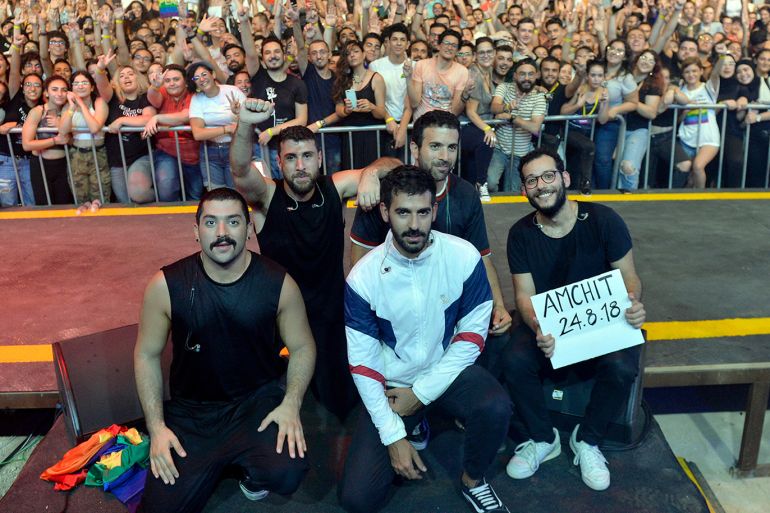 epa07736691 (FILE) - Hamed Sinno (front,L), the lead singer of Lebanese alternative rock band Mashrou' Leila, poses with group members after their concert at Amchit International Festival in Amchit north of Beirut, Lebanon, 24 August 2018 (reissued 24 July 2019). According to media reports, the Maronite Archdiocese of Jbeil (Byblos) asked the committee of Byblos International Festival to cancel the concert of Mashrou' Leila set for 09 August 2019. They said in a statement that the lyrics of their songs are against Christianity as well as humanity. Hamed Sinno is openly gay and the songs of the group back LGBT rights. In September 2017, the government of Egypt banned Mashrou? Leila from returning following the arrest of at least six people who raised a rainbow flag during a concert in Cairo. EPA-EFE/WAEL HAMZEH