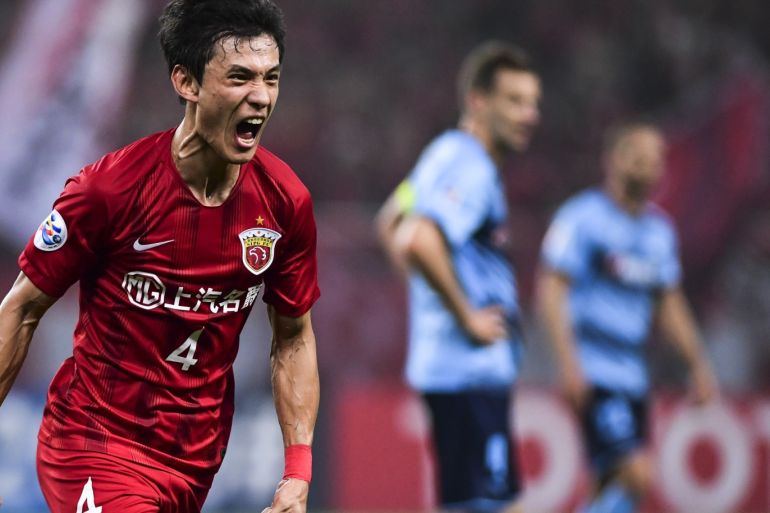 SHANGHAI, CHINA - APRIL 23: Wang Shenchao #4 of Shanghai SIPG celebrates a goal during the AFC Champions League Group H match between Sydney FC and Shanghai SIPG at Shanghai Stadium on April 23, 2019 in Shanghai, China. (Photo by Di Yin/Getty Images)