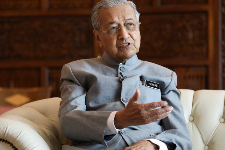 Malaysia's Prime Minister Mahathir Mohamad speaks during an interview with Reuters in Putrajaya, Malaysia, December 10, 2019. REUTERS/Lim Huey Teng