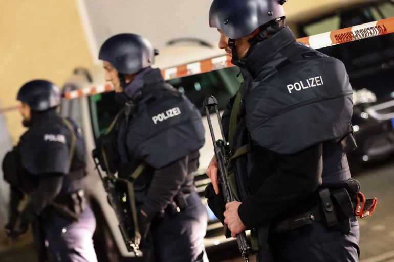 Police officers secure an area after a shooting in Hanau near Frankfurt, Germany, February 20, 2020. REUTERS/Kai Pfaffenbach