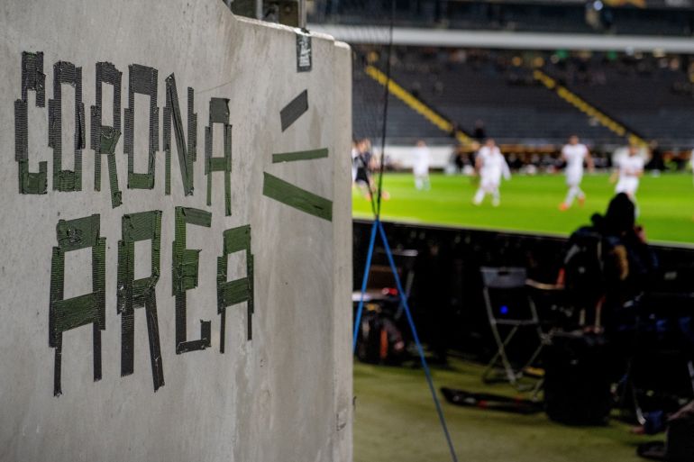 FRANKFURT AM MAIN, GERMANY - MARCH 12: A sign named Corona Area is seen inside the stadium during the UEFA Europa League round of 16 first leg match between Eintracht Frankfurt and FC Basel at Commerzbank Arena on March 12, 2020 in Frankfurt am Main, Germany. The match is played behind closed doors as a precaution against the spread of COVID-19 (Coronavirus). (Photo by Matthias Hangst/Bongarts/Getty Images)