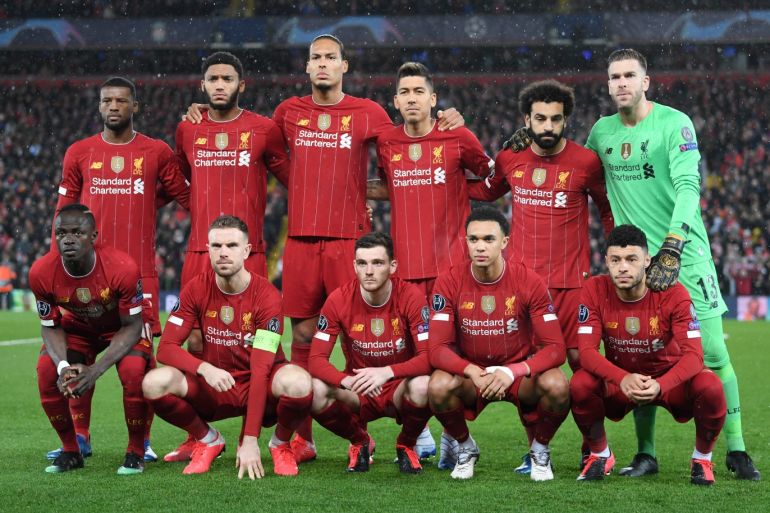 LIVERPOOL, ENGLAND - MARCH 11: The Liverpool Team line up ahead of the UEFA Champions League round of 16 second leg match between Liverpool FC and Atletico Madrid at Anfield on March 11, 2020 in Liverpool, United Kingdom. (Photo by Laurence Griffiths/Getty Images)