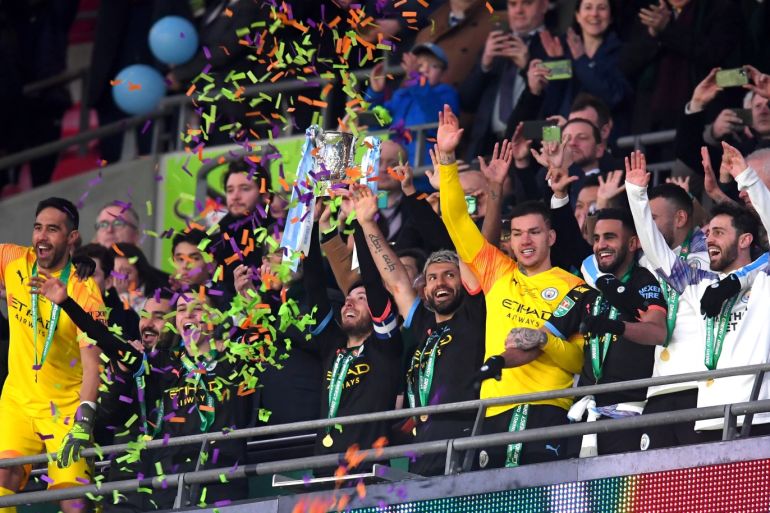 LONDON, ENGLAND - MARCH 01: David Silva of Manchester City lifts The Carabao Cup trophy following his side's victory during the Carabao Cup Final between Aston Villa and Manchester City at Wembley Stadium on March 01, 2020 in London, England. (Photo by Laurence Griffiths/Getty Images)