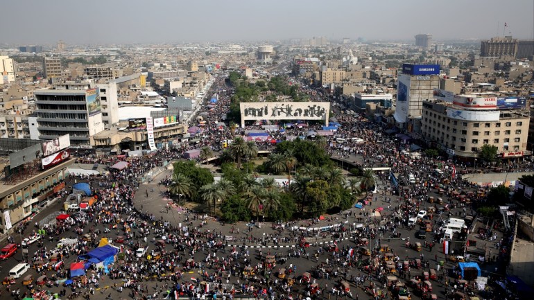 Anti government protests in Iraq- - BAGHDAD, IRAQ - NOVEMBER 03: Protestors gather to attend ongoing anti-government demonstrations economic reforms and overhaul of the political system, at Tahrir Square in Baghdad, Iraq Baghdad on November 03, 2019. The escalation is part of a civil disobedience campaign waged by protesters to pile pressure on the Iraqi government to fulfill their demands.