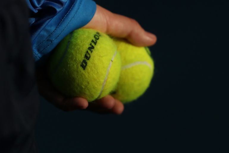 ADELAIDE, AUSTRALIA - JANUARY 18: A ball kid holds tennis balls during the men's singles grand final between Lloyd Harris of South Africa and Andrey Rublev of Russia on day seven of the 2020 Adelaide International at Memorial Drive on January 18, 2020 in Adelaide, Australia. (Photo by Paul Kane/Getty Images)