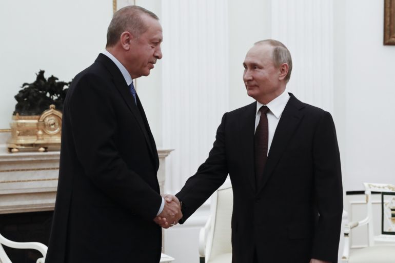 Erdogan - Putin meeting in Moscow- - MOSCOW, RUSSIA - MARCH 5: Turkish President Recep Tayyip Erdogan (L) meets Russian President Vladimir Putin (R) in Moscow, Russia on March 5, 2020.