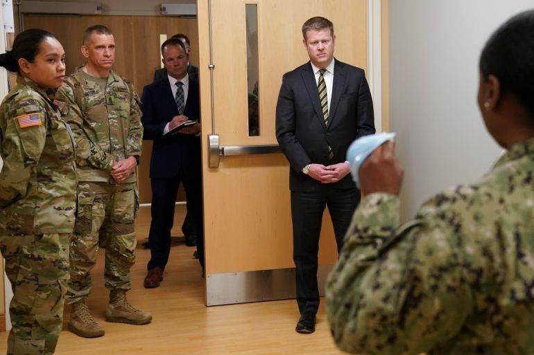 U.S. Secretary of the Army Ryan McCarthy tours the coronavirus preparedness facilities at Fort Belvoir Community Hospital in Fort Belvoir, Virginia, U.S., March 18, 2020. REUTERS/Kevin Lamarque
