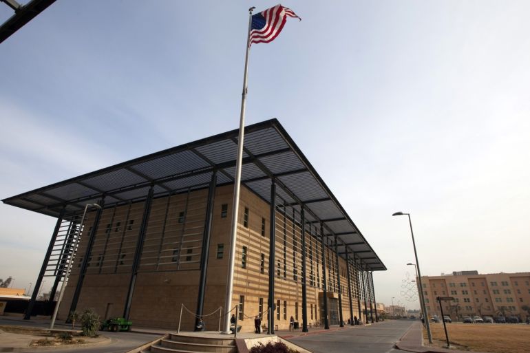 A U.S. flag flies in front of the Annex I building inside the compound of the U.S. embassy in Baghdad December 14, 2011. The compound, located in Baghdad's Green Zone, will be the home for thousands of American citizens left after the U.S. military completes its withdrawal this month. REUTERS/Lucas Jackson (IRAQ - Tags: POLITICS CONFLICT MILITARY SOCIETY)