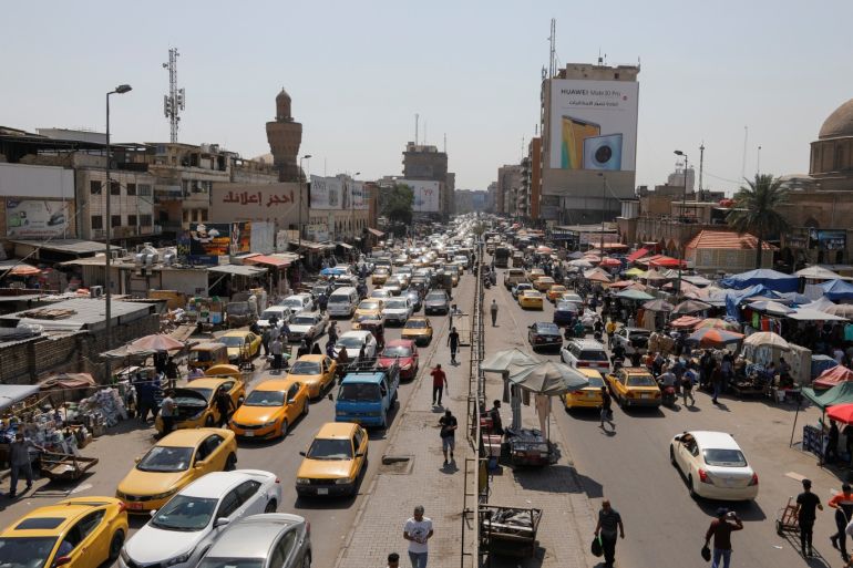 A general view of traffic, after the lockdown measures following the outbreak of the coronavirus disease (COVID-19) were partially eased, in Baghdad, Iraq, April 21, 2020. REUTERS/Khalid al Mousily