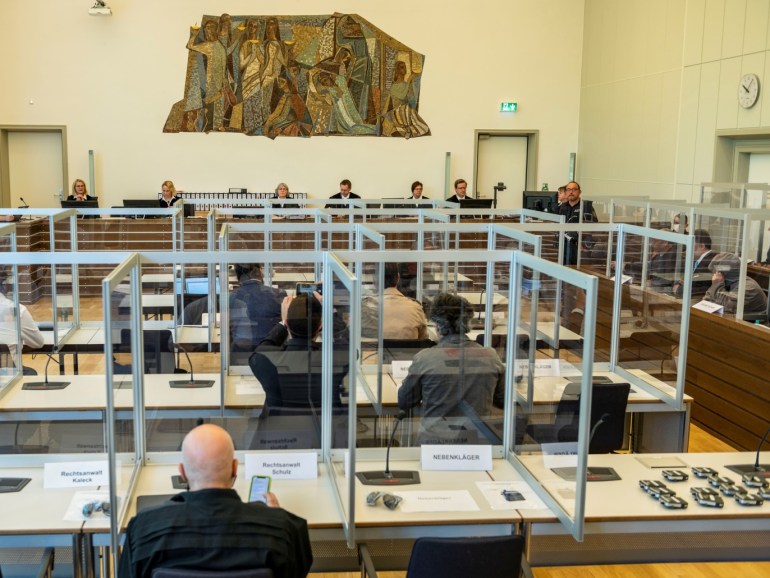 Joint plaintiffs are seen at the courtroom prior to the start of the first trial of suspected members of Syrian President Bashar al-Assad's security services for crimes against humanity, in Koblenz, Germany, April 23, 2020. Thomas Lohnes/Pool via REUTERS