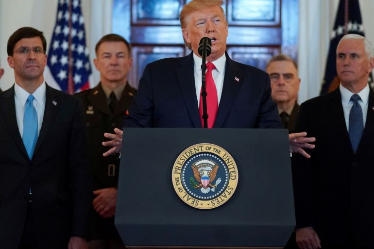 U.S. President Donald Trump delivers a statement about Iran flanked by U.S. Secretary of Defense Mark Esper, Vice President Mike Pence and military leaders in the Grand Foyer at the White House in Washington, U.S., January 8, 2020. REUTERS/Kevin Lamarque TPX IMAGES OF THE DAY