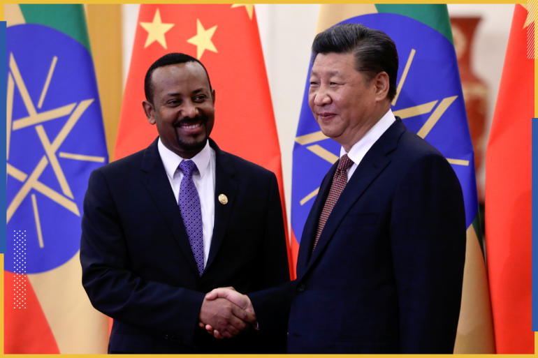 Ethiopia's Prime Minister Abiy Ahmed and China's President Xi Jinping shake hands before their bilateral meeting at the Great Hall of the People in Beijing, China September 2, 2018. Andy Wong/Pool via REUTERS