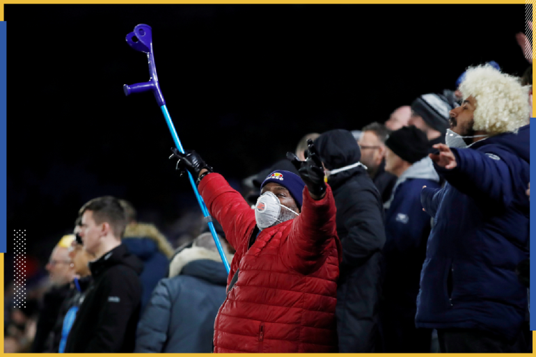 Soccer Football - FA Cup Fifth Round - Leicester City v Birmingham City - King Power Stadium, Leicester, Britain - March 4, 2020 A Birmingham City fan wears a face mask amid concern following the coronavirus outbreak Action Images via Reuters/Matthew Childs