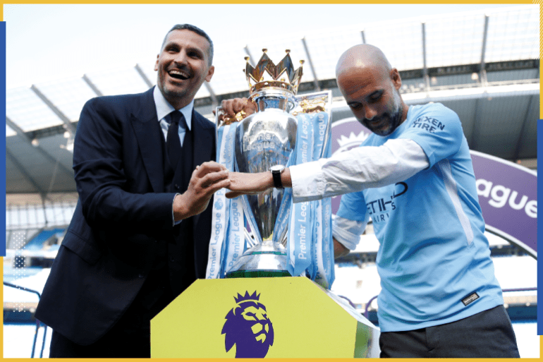 Soccer Football - Premier League - Manchester City vs Huddersfield Town - Etihad Stadium, Manchester, Britain - May 6, 2018 Manchester City manager Pep Guardiola and chairman Khaldoon Al Mubarak celebrate with the trophy after winning the Premier League title Action Images via Reuters/Carl Recine EDITORIAL USE ONLY. No use with unauthorized audio, video, data, fixture lists, club/league logos or "live" services. Online in-match use limited to 75 images, no video emulation. No use in betting, games or single club/league/player publications. Please contact your account representative for further details.