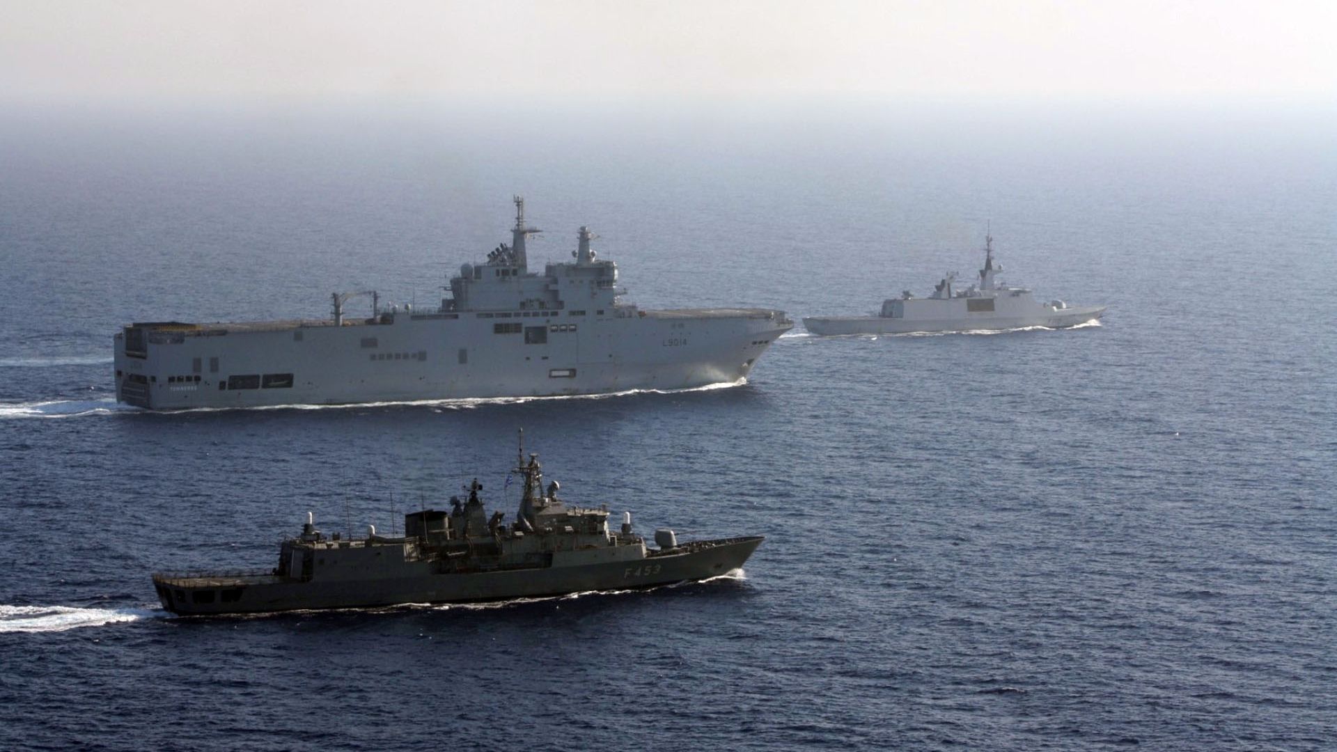 Greek and French vessels sail in formation during a joint military exercise in Mediterranean sea