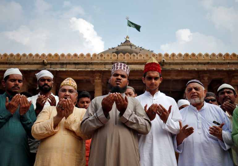 Muslims pray for peace ahead of verdict on a disputed religious site in Ayodhya, inside a mosque premises in Ahmedabad