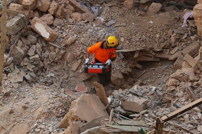 A member of the rescue team walks on the rubble of buildings damaged due to the massive explosion at Beirut's port area A member of the rescue team walks on the rubble of buildings damaged due to the massive explosion at Beirut's port area, in Gemmayze, Lebanon September 4, 2020. REUTERS/Aziz Taher