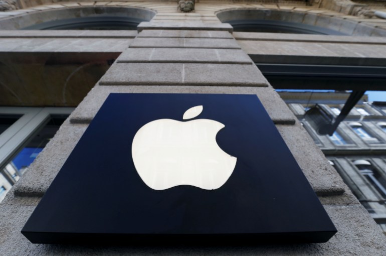 FILE PHOTO: The logo of Apple company is seen outside an Apple store in Bordeaux, France, March 22, 2019. REUTERS/Regis Duvignau/File Photo