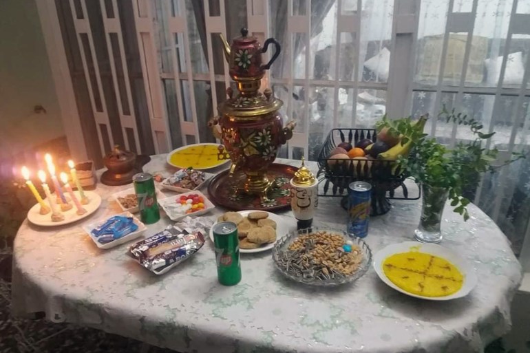 حلوى الزردة وشموع في احتفالات المولد النبوي في العراق