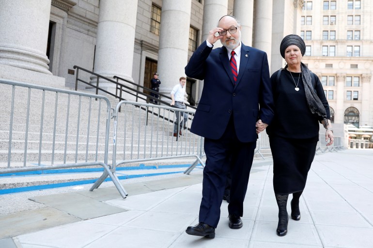 Jonathan Pollard, a former U.S. Navy intelligence officer convicted of spying for Israel, exits following a hearing at the Manhattan Federal Courthouse in New York