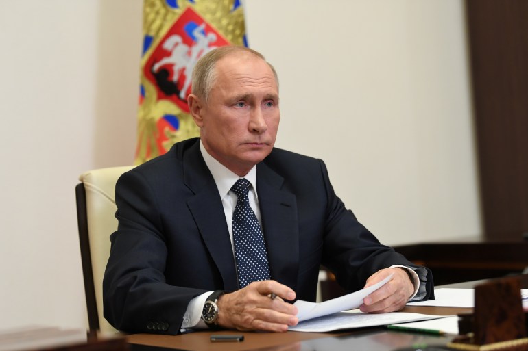 Russian President Putin attends a meeting on a humanitarian mission in the region of Nagorno-Karabakh, outside Moscow