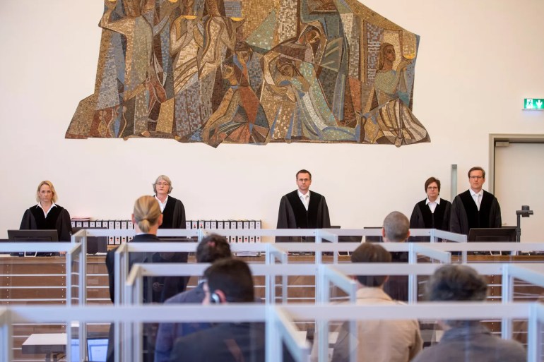 The first trial of members of Syrian security services for crimes against humanity taking place in Germany. Photograph: Reuters