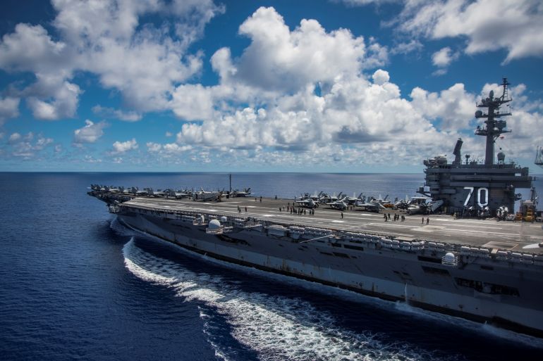 The Nimitz-class U.S. Navy aircraft carrier USS Carl Vinson transits the Philippine Sea